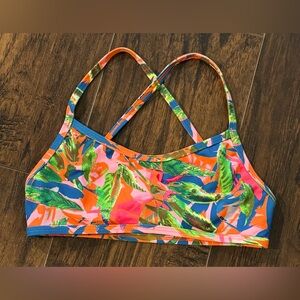 Jolyn " Adrian" style bikini top.
Only worn twice! Fixed back criss cross straps